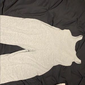 Size Medium Open Back Jump Suit Grey